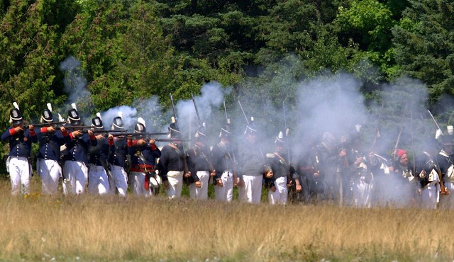 American troops, represented by these reenactors, battled British forces on a site which is now part of the Wawashkamo Golf Club on Mackinac Island.